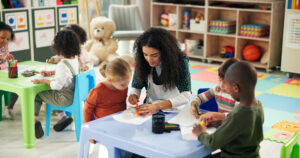 teacher students in preschool class